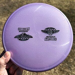 Champion Moondust Classic Roc w/2 mini Innova Air Force stamps -- 173-5 grams (4050)