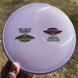 Champion Moondust Classic Roc w/2 mini Innova Air Force stamps -- 173-5 grams (4051)